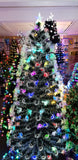 Load image into Gallery viewer, 7ft Snow Tipped Green Christmas Tree with Multi-Coloured Starbursts