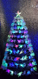 Load image into Gallery viewer, 5ft Snow Tipped Green Christmas Tree with Multi-Coloured Starbursts